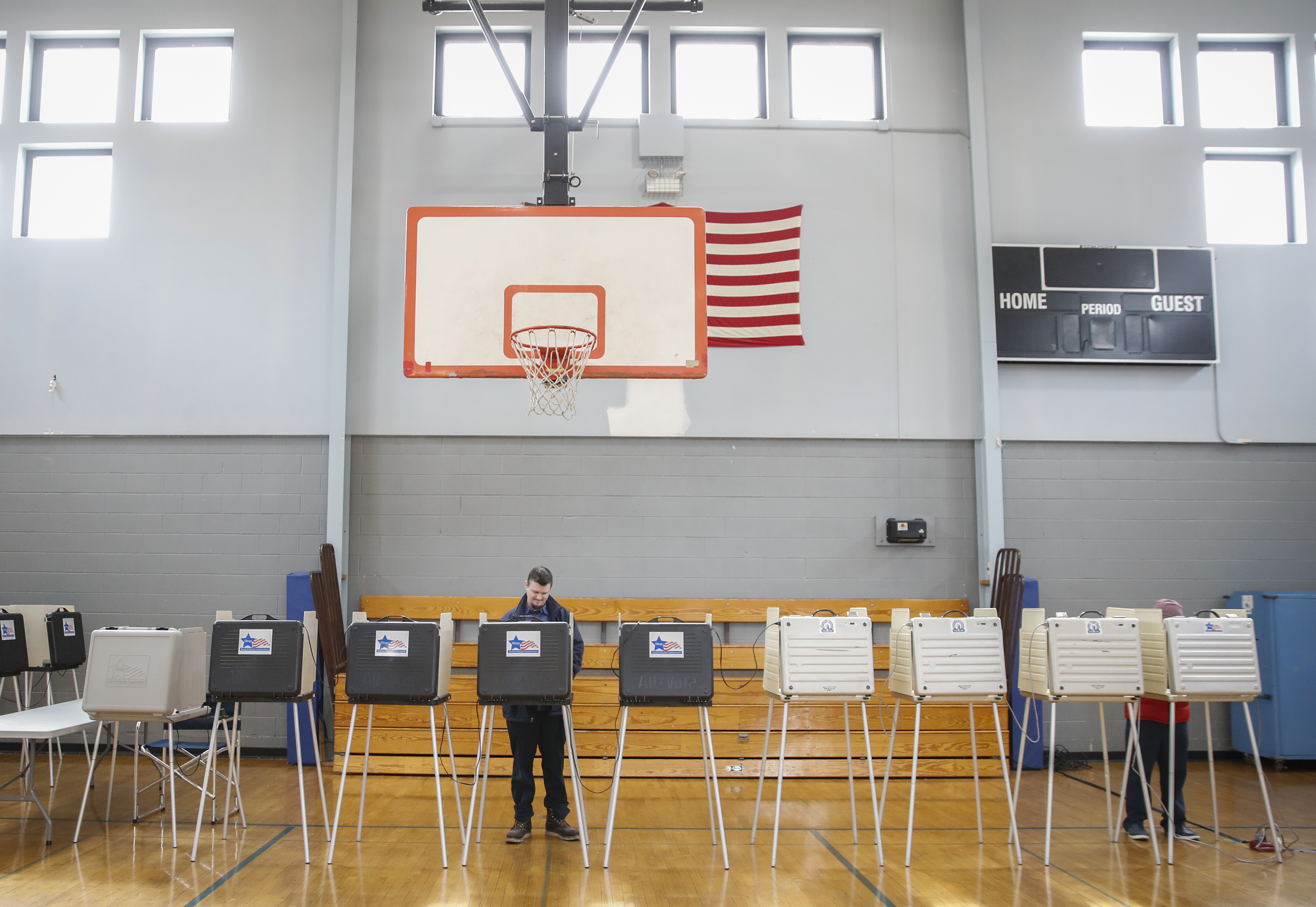 Voters cast their ballots at the polling place in the Father Thomas A. Bernas Parish Center in Chicago, Illinois on April 2, 2019. CREDIT: KAMIL KRZACZYNSKI/AFP/Getty Images