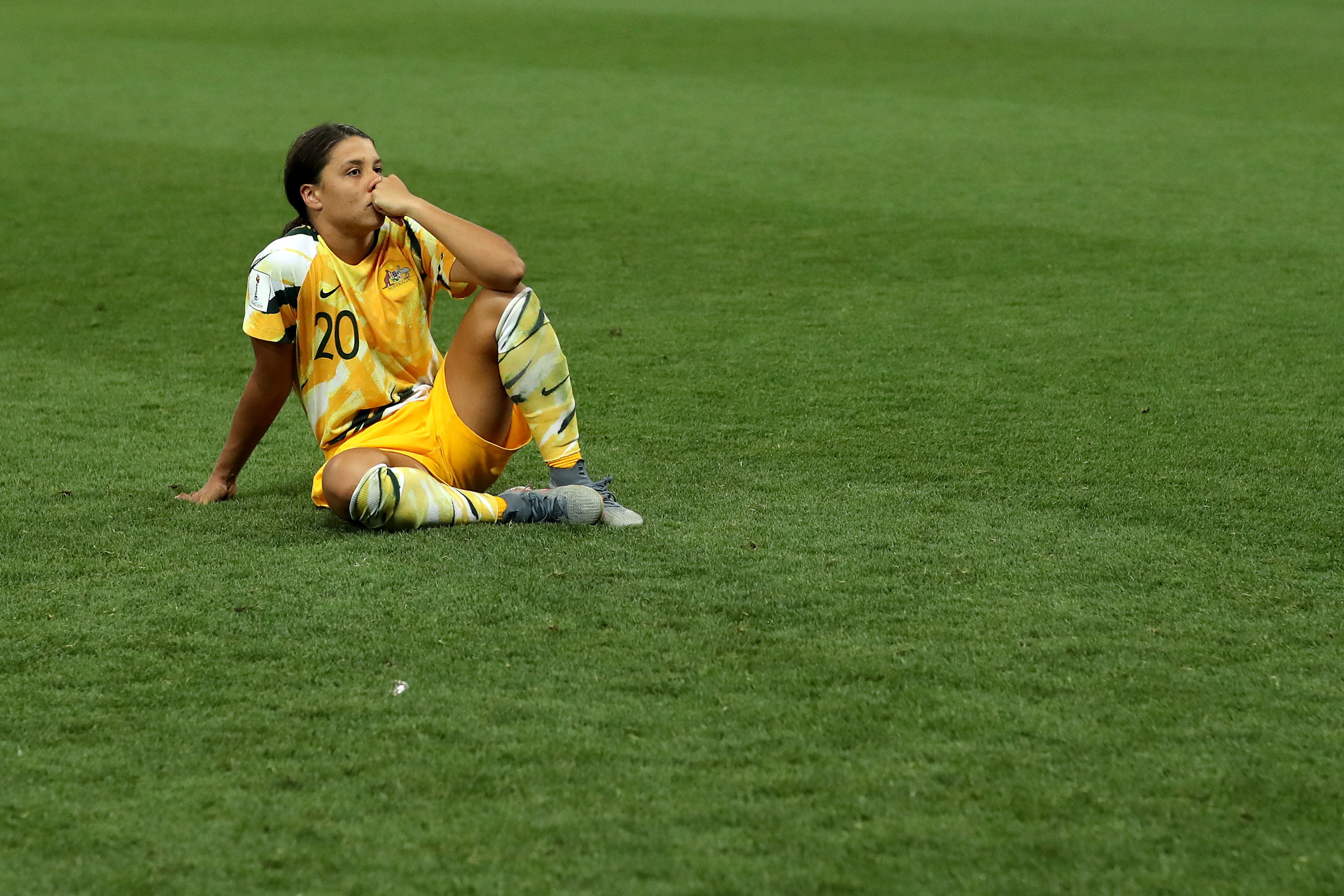 Sam Kerr of Australia looks dejected after losing the penalty shoot out during the 2019 FIFA Women's World Cup France Round Of 16 match between Norway and Australia at Stade de Nice on June 22, 2019 in Nice, France. (Credit: Hannah Peters - FIFA/FIFA via Getty Images)