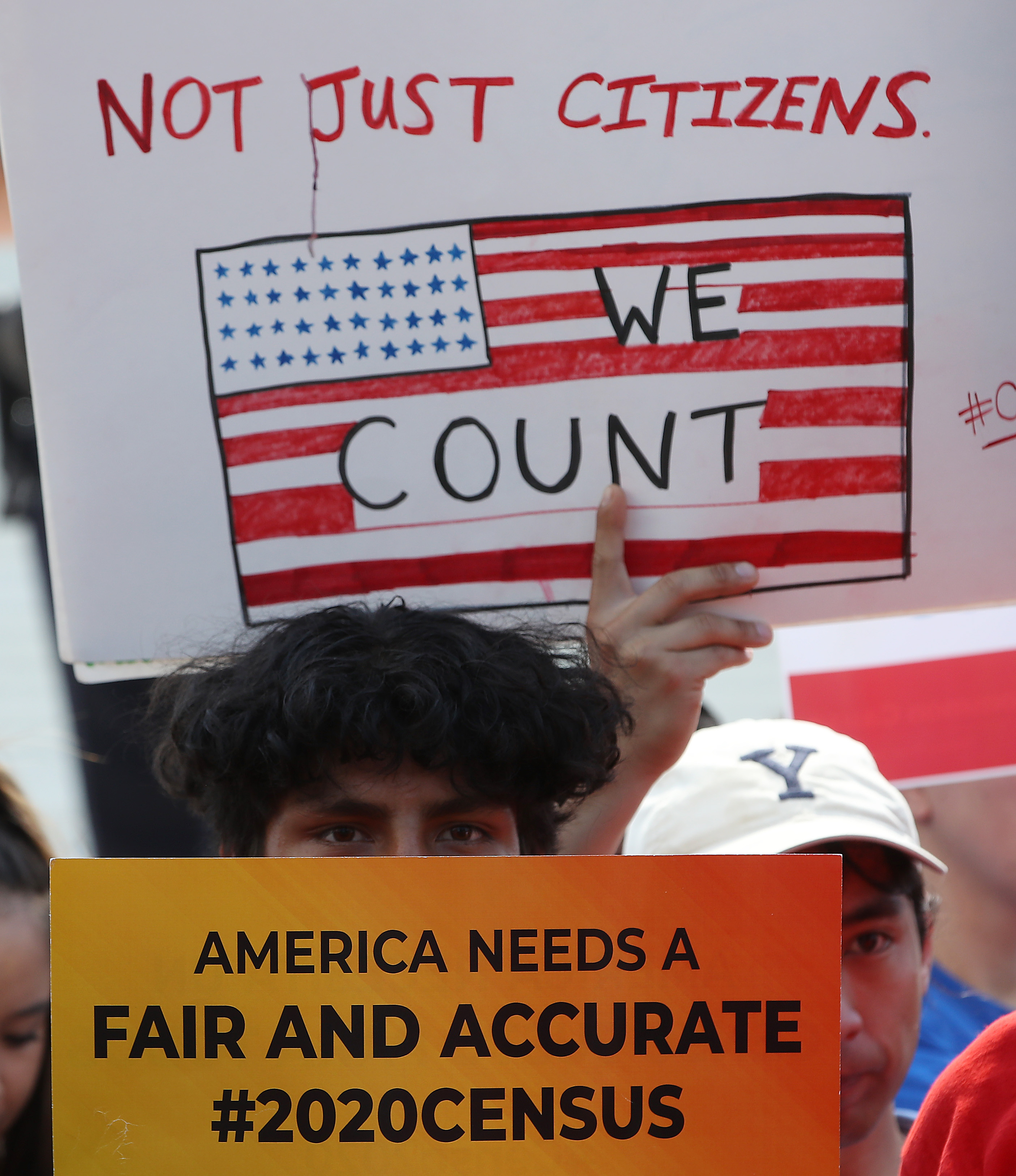 WASHINGTON, DC - JUNE 27: People gather in in front of the U.S. Supreme Court as decisions are handed down on June 27, 2019 in Washington, DC. The high court blocked a citizenship question from being added to the 2020 census for now, and in another decision ruled that the Constitution does not bar partisan gerrymandering. (Photo by Mark Wilson/Getty Images)