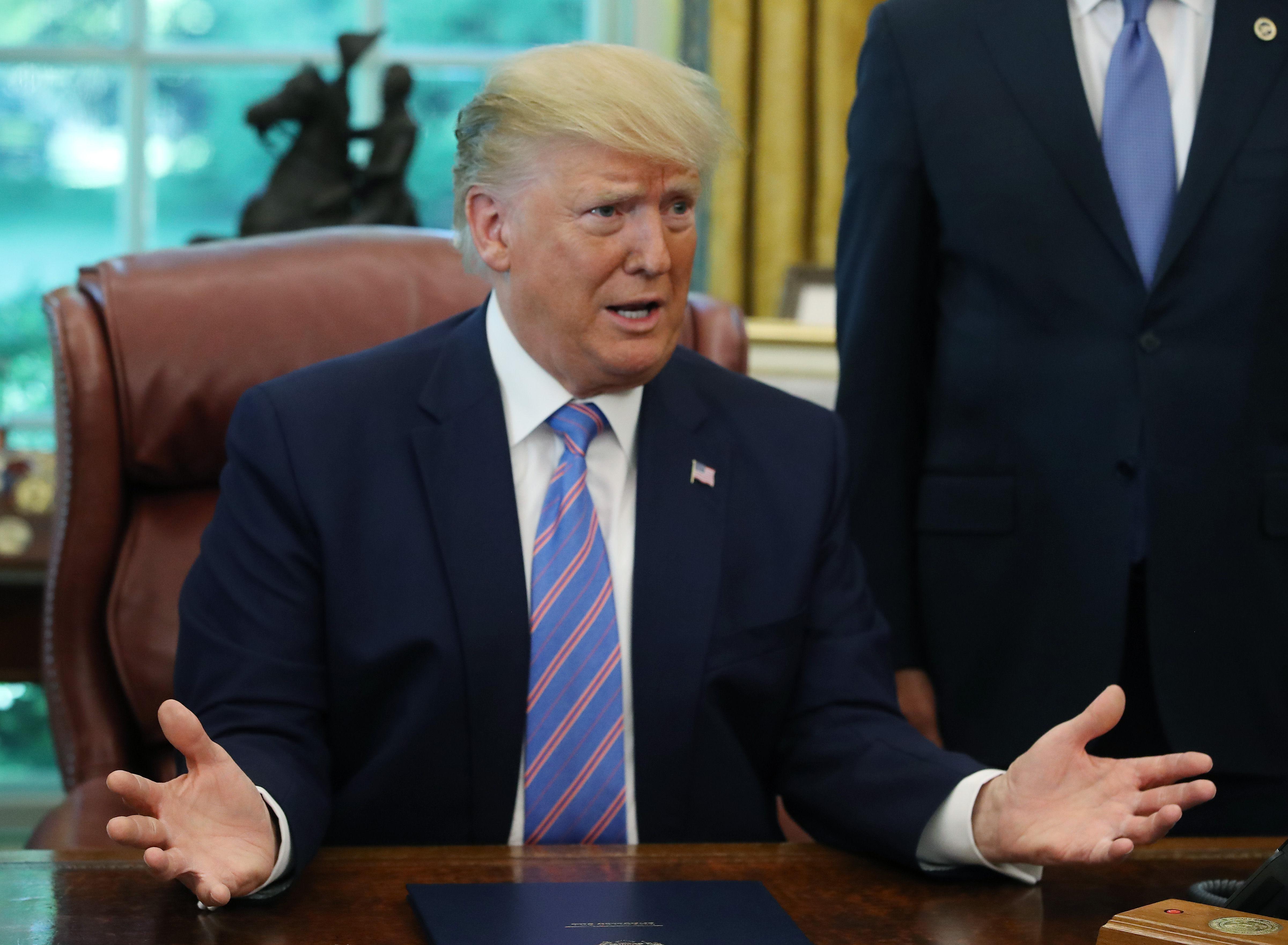 President Donald Trump speaks to the media in the Oval Office at the White House on July 1, 2019 in Washington, D.C..CREDIT: Mark Wilson/Getty Images.