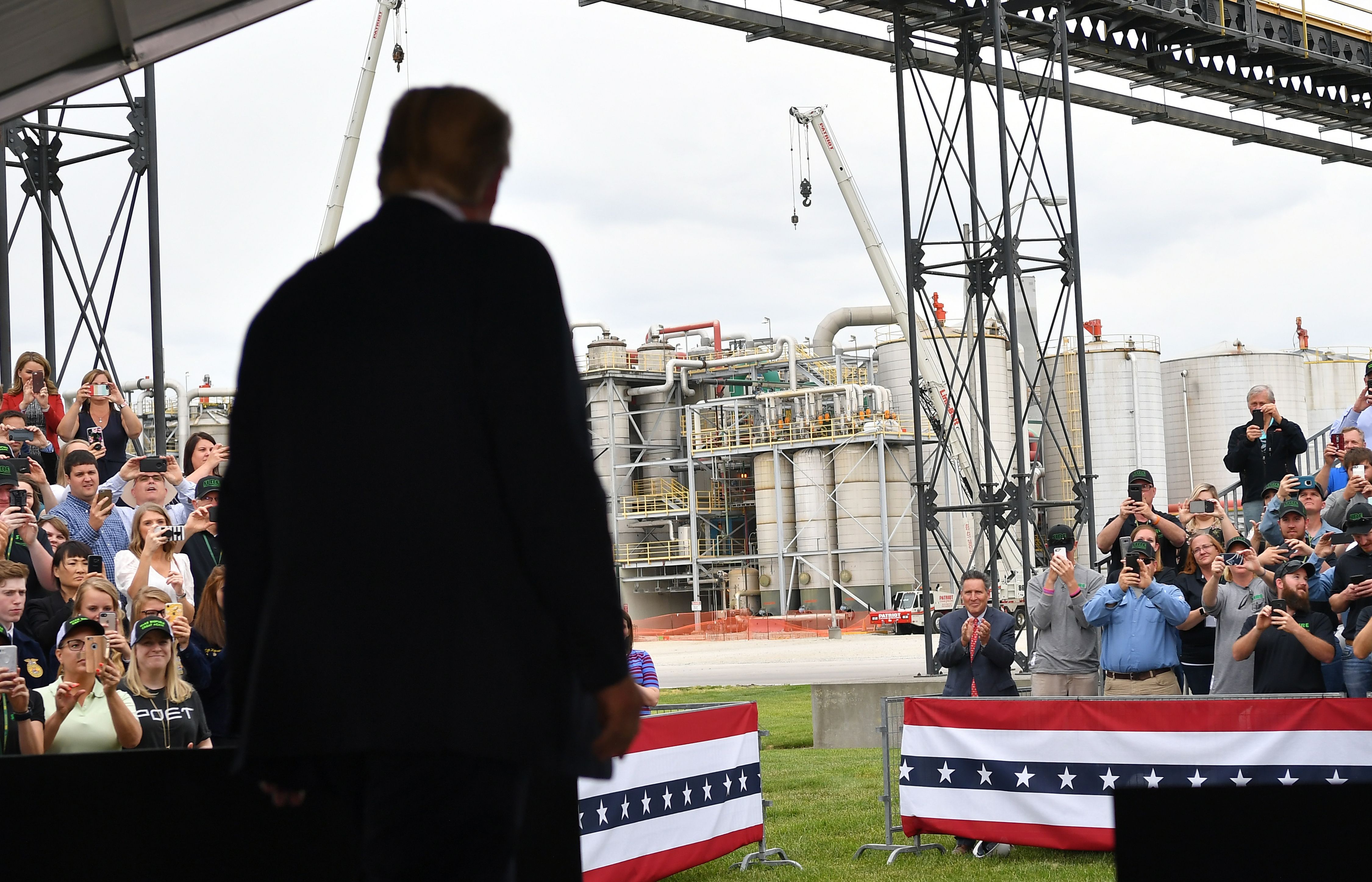 US President Donald Trump arrives on stage to speak following a tour of the Southwest Iowa Renewable Energy ethanol plant in Council Bluffs, Iowa on June 11, 2019. (Photo credit: MANDEL NGAN/AFP/Getty Images)