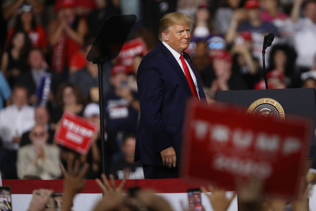 President Donald Trump scolded one of his own supporters over his weight at a Thursday rally in Manchester, New Hampshire, demanding the man be ejected.