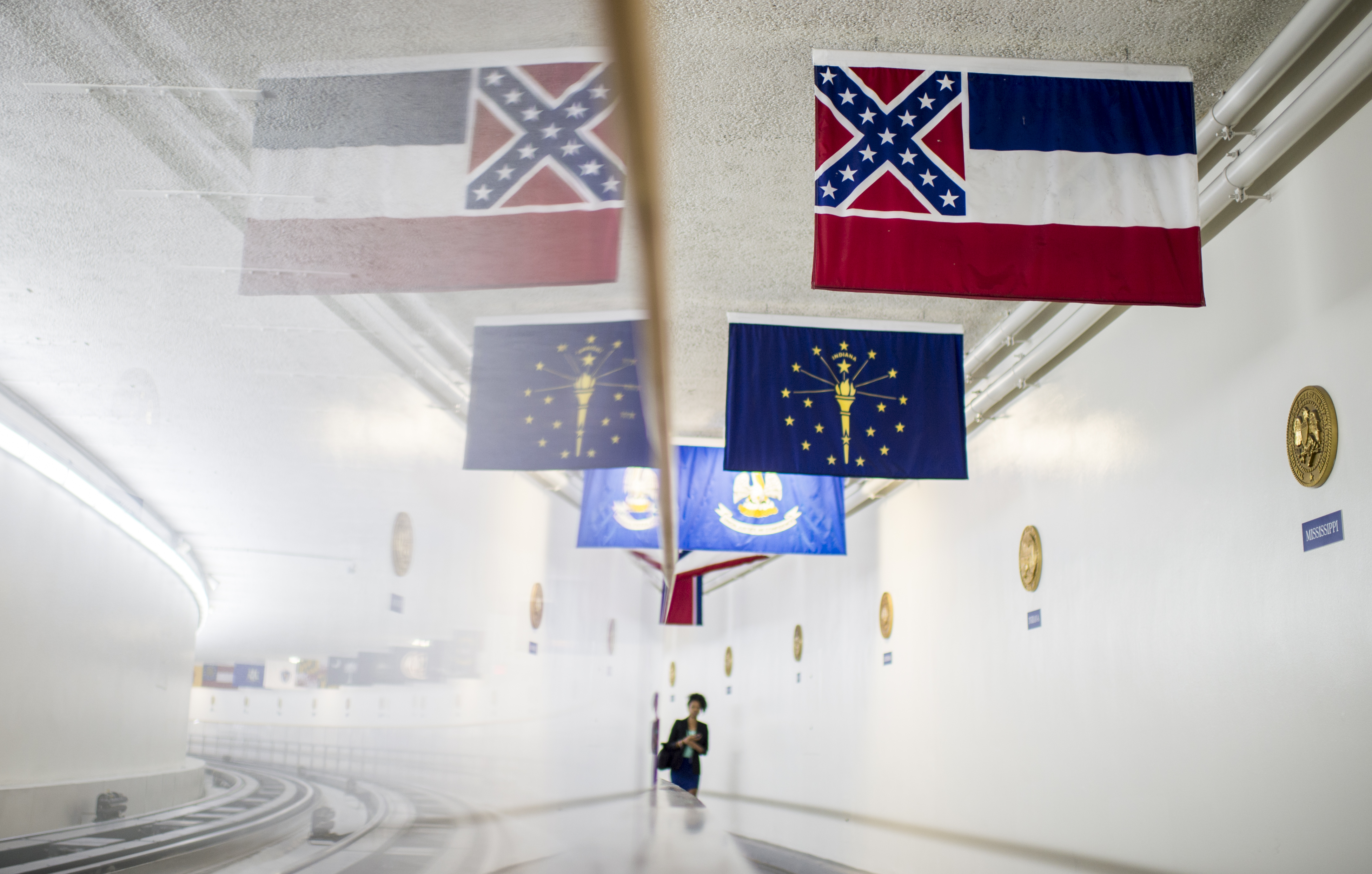 UNITED STATES - JUNE 24: The Mississippi state flag, which includes the Confederate battle flag as part of its design, hangs in the U.S. Capitol along the Senate subway. (Photo By Bill Clark/CQ Roll Call)