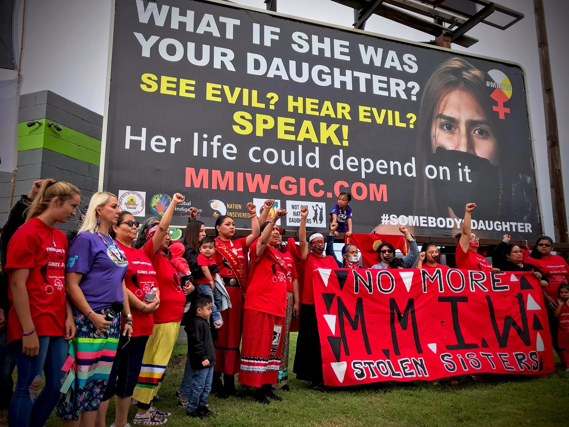 Missing or Murdered Indigenous Women (MMIW) survivors or family members of victims from numerous tribes march in front of a billboard raising awareness to the MMIW epidemic at Ponca Nation in Oklahoma, May 18, 2019. Credit: Alter-Native Media/GIC