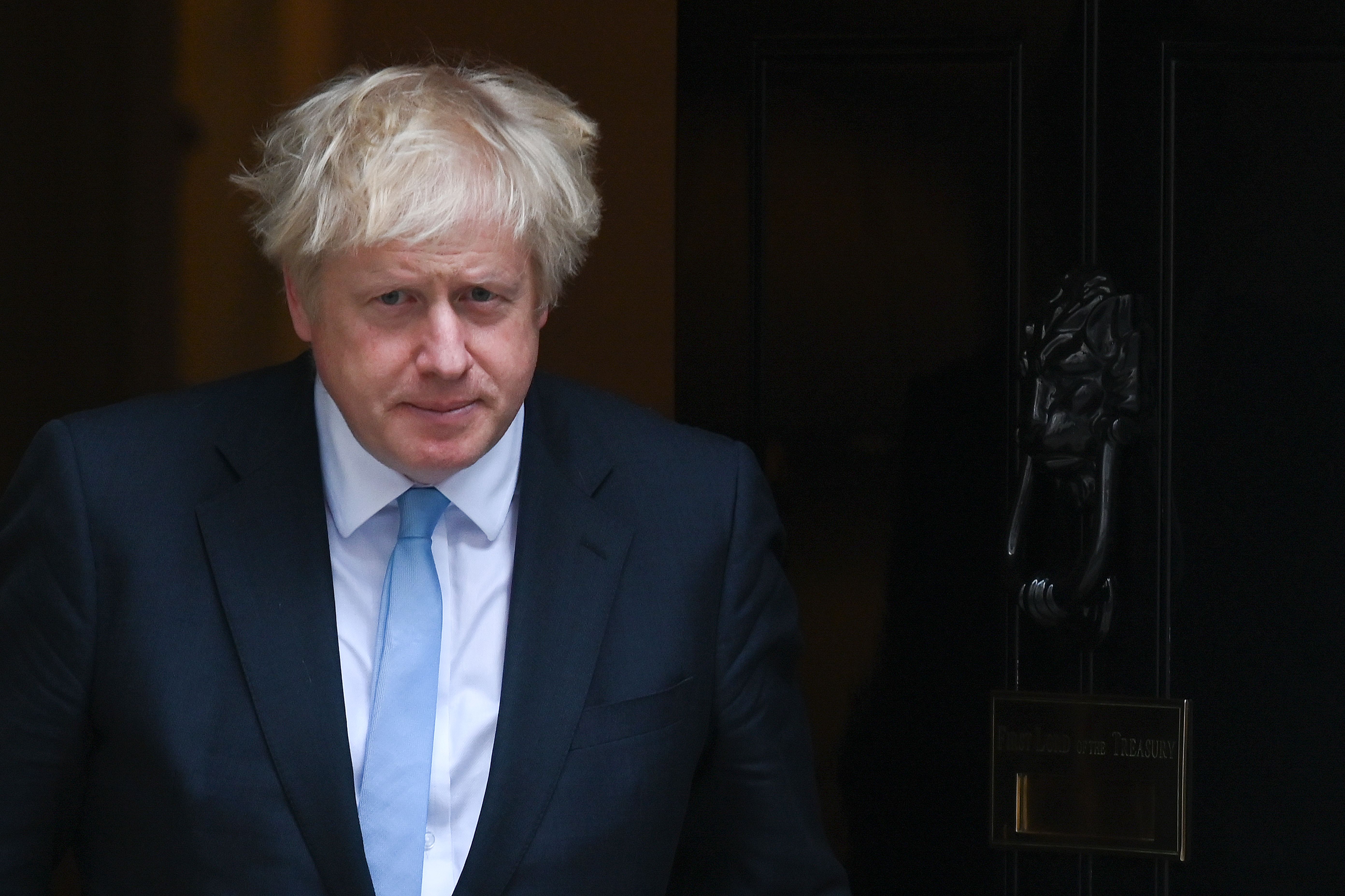 Britain's Prime Minister Boris Johnson comes out to greet US Vice-President Mike Pence (unseen) outside 10 Downing Street in central London on September 5, 2019. - UK Prime Minister Boris Johnson called Thursday for an early election after a series of votes in parliament tore up his hardline Brexit strategy and left him without a majority. (Photo by DANIEL LEAL-OLIVAS / AFP) (Photo credit should read DANIEL LEAL-OLIVAS/AFP/Getty Images)