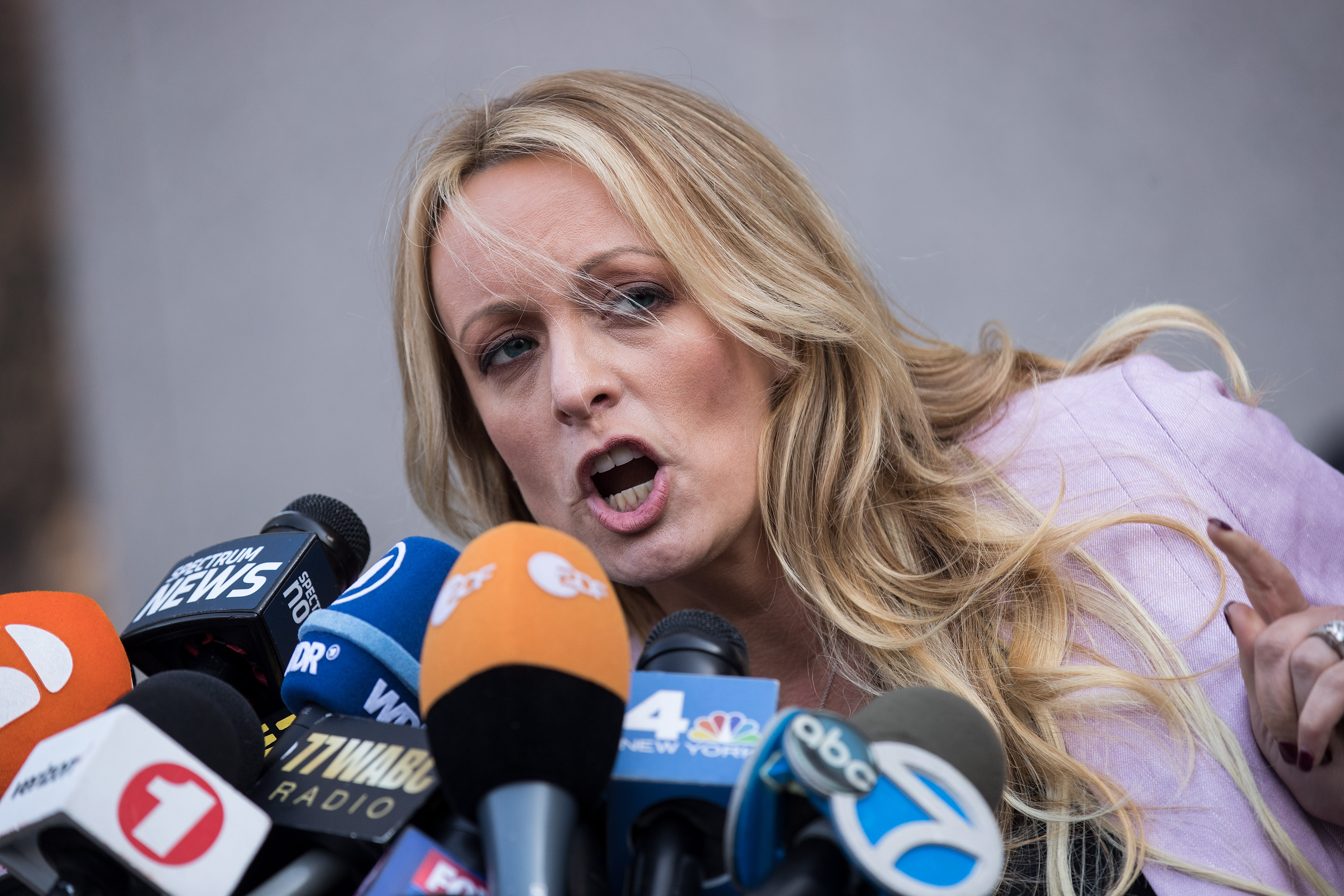 NEW YORK, NY - APRIL 16: Adult film actress Stormy Daniels (Stephanie Clifford) speaks to reporters as she exits the United States District Court Southern District of New York for a hearing related to Michael Cohen, President Trump's longtime personal attorney and confidante, April 16, 2018 in New York City. Credit: Drew Angerer/Getty Images